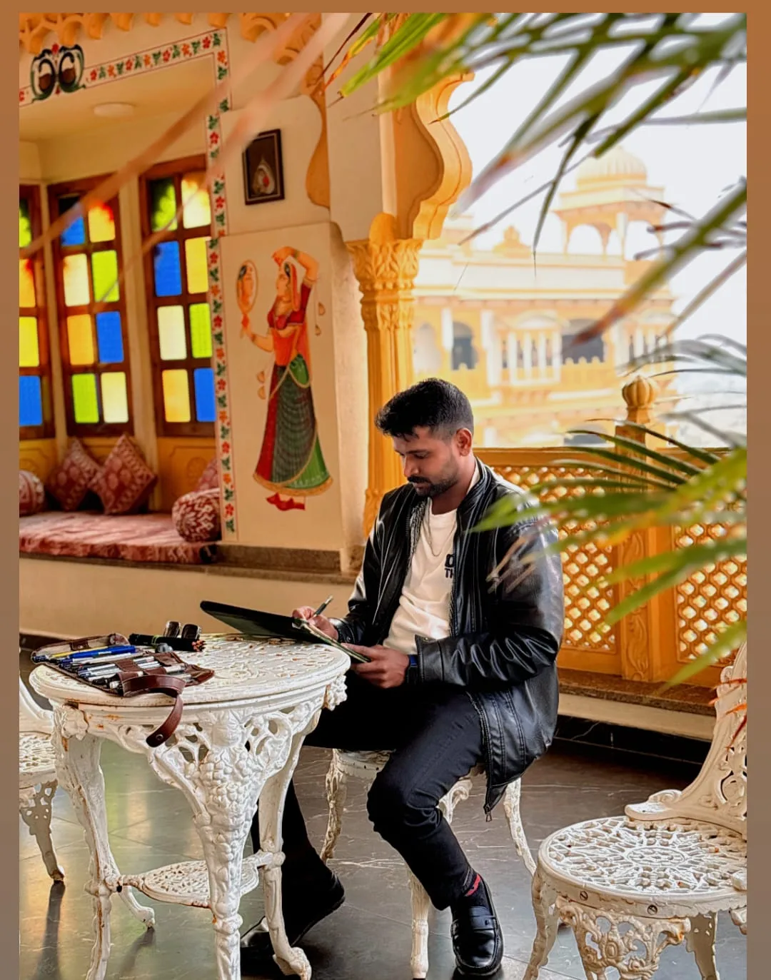 Raju Kumawat painting live at an event